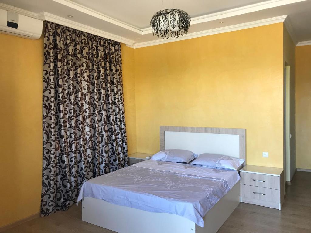 Postel nebo postele na pokoji v ubytování Guest House Kobuleti