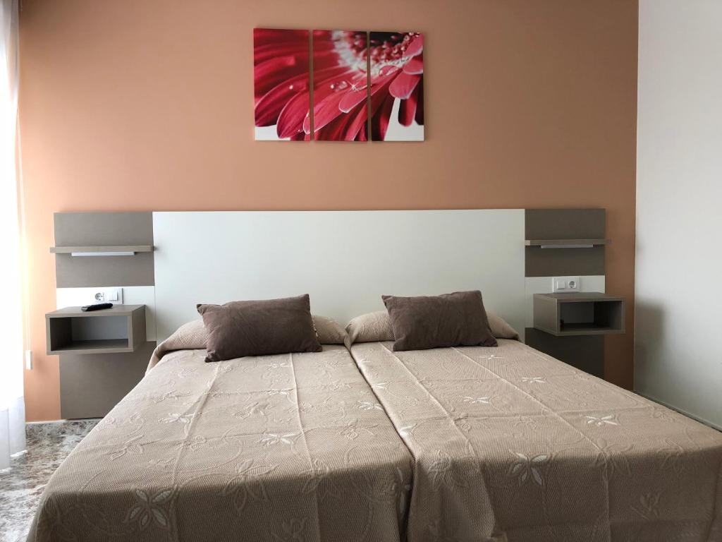 Postel nebo postele na pokoji v ubytování Pension Casa Prieto
