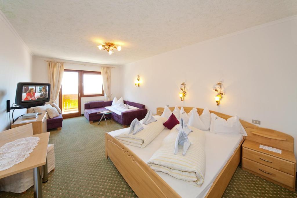 Voodi või voodid majutusasutuse Hotel Gstatsch toas