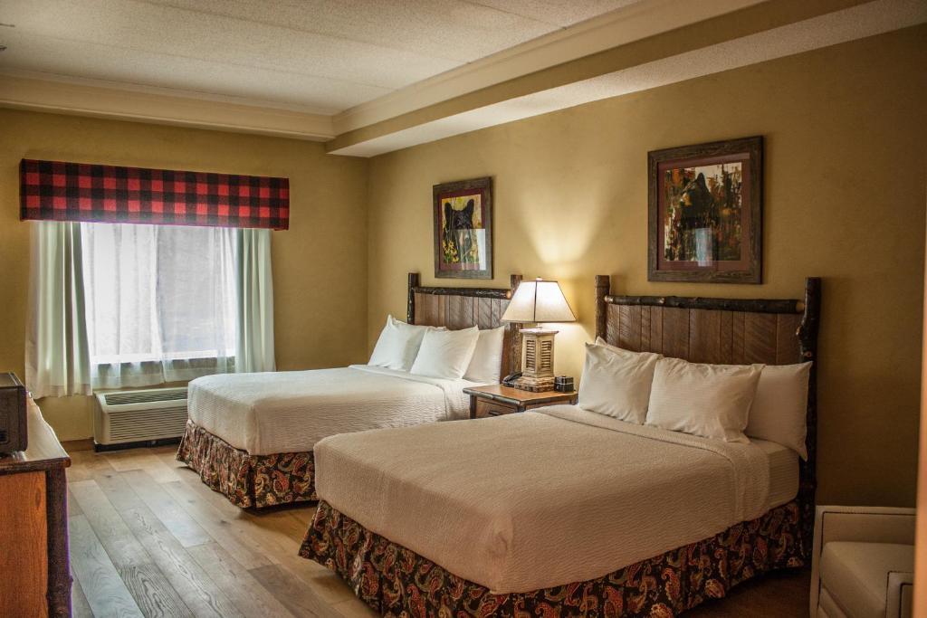 Ein Bett oder Betten in einem Zimmer der Unterkunft The Appy Lodge
