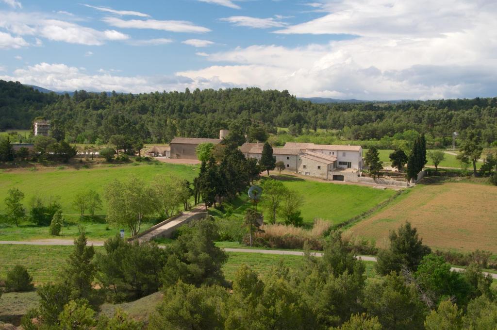 a view of the farm from the hill at Les Gites du Chateau St Jacques d'Albas in Laure-Minervois
