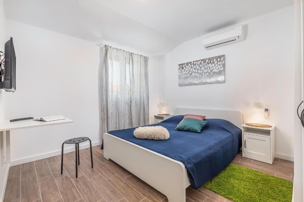 Posteľ alebo postele v izbe v ubytovaní Villa Polion Valbandon