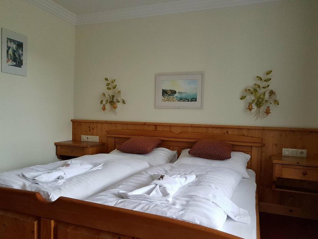 Postel nebo postele na pokoji v ubytování Hotel Tauplitzerhof