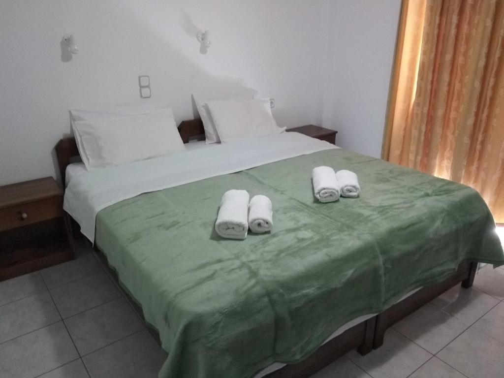 Postel nebo postele na pokoji v ubytování Litsa Mare Apartments