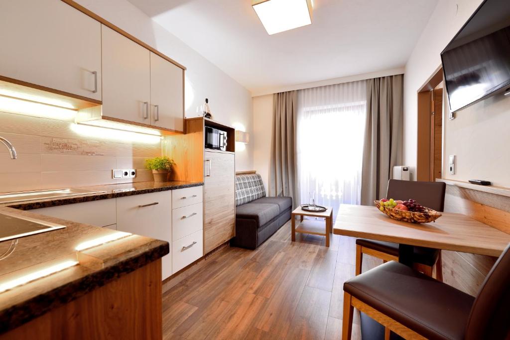 Kuchyň nebo kuchyňský kout v ubytování Aparthotel Garni Monte