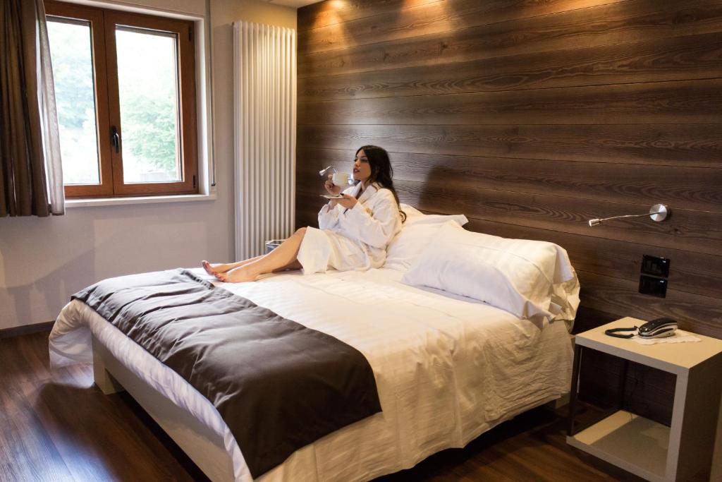 Postel nebo postele na pokoji v ubytování Hotel Centrale