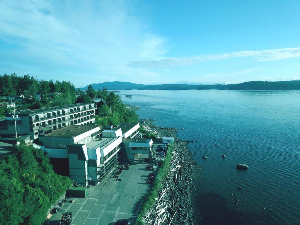 arial view of a lake with buildings on the shore at Anchor Inn and Suites in Campbell River