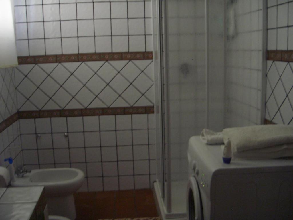 A bathroom at L'Oasi di Ambra Dependance