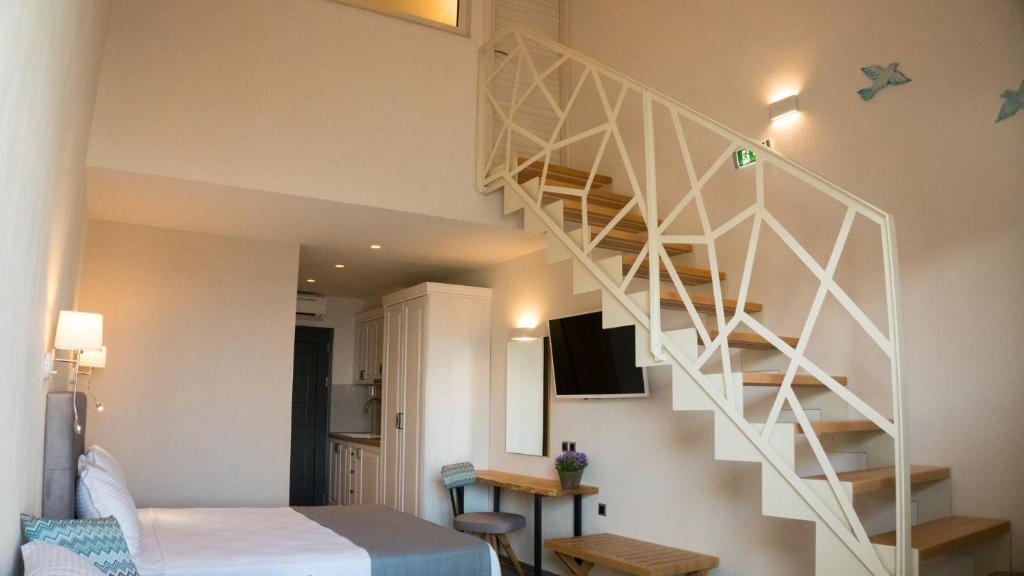 Posteľ alebo postele v izbe v ubytovaní Costa Domus Blue Luxury Apartments