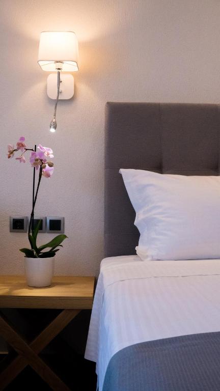 Posteľ alebo postele v izbe v ubytovaní Costa Domus Blue Luxury Apartments