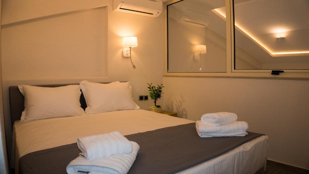 Posteľ alebo postele v izbe v ubytovaní Costa Domus Blue Luxury Apartments