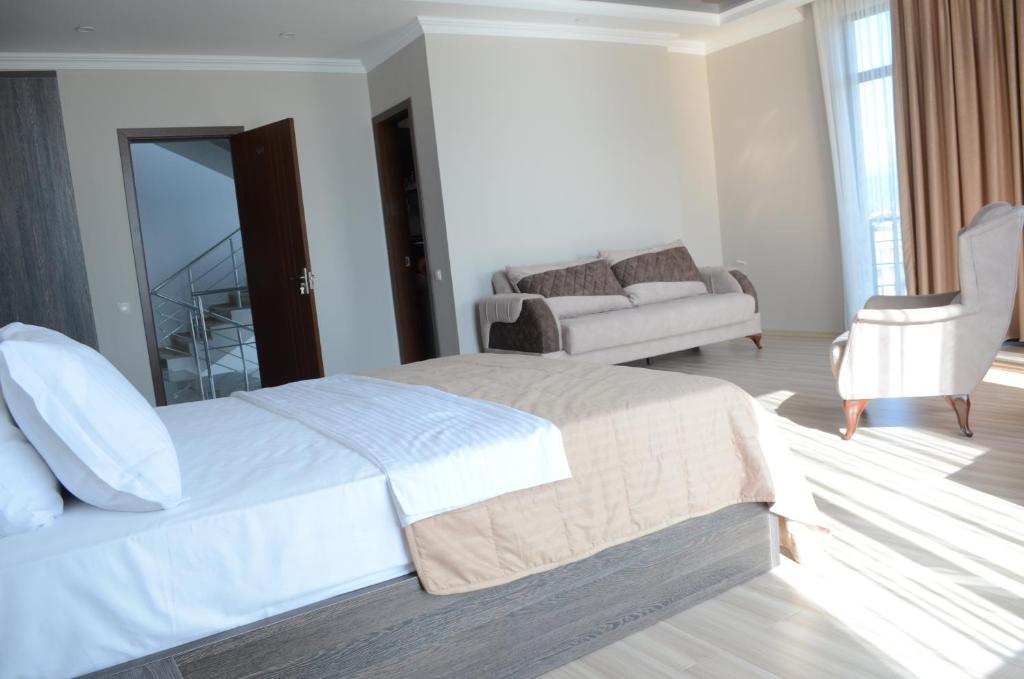 Postel nebo postele na pokoji v ubytování Hotel Skyline Batumi
