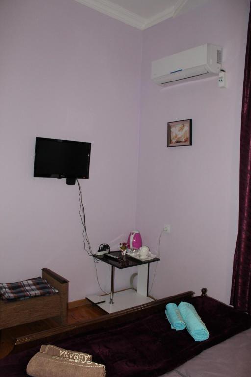 TV a/nebo společenská místnost v ubytování La Deka GuestHouse