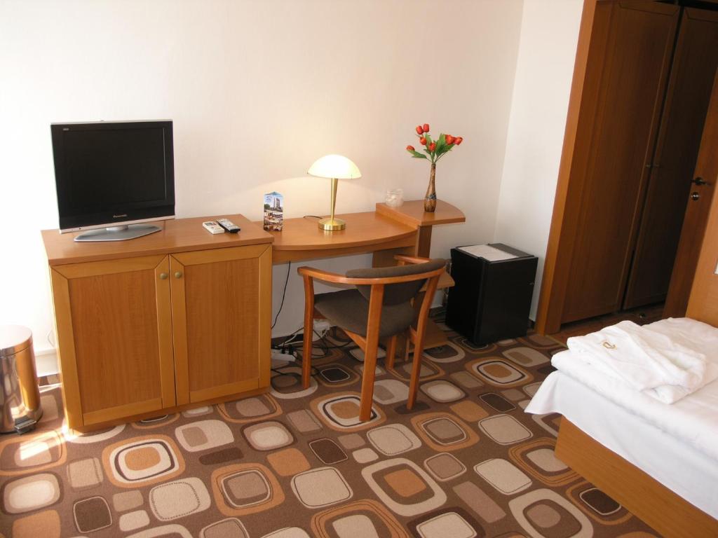 Postel nebo postele na pokoji v ubytování Hotel Druzba