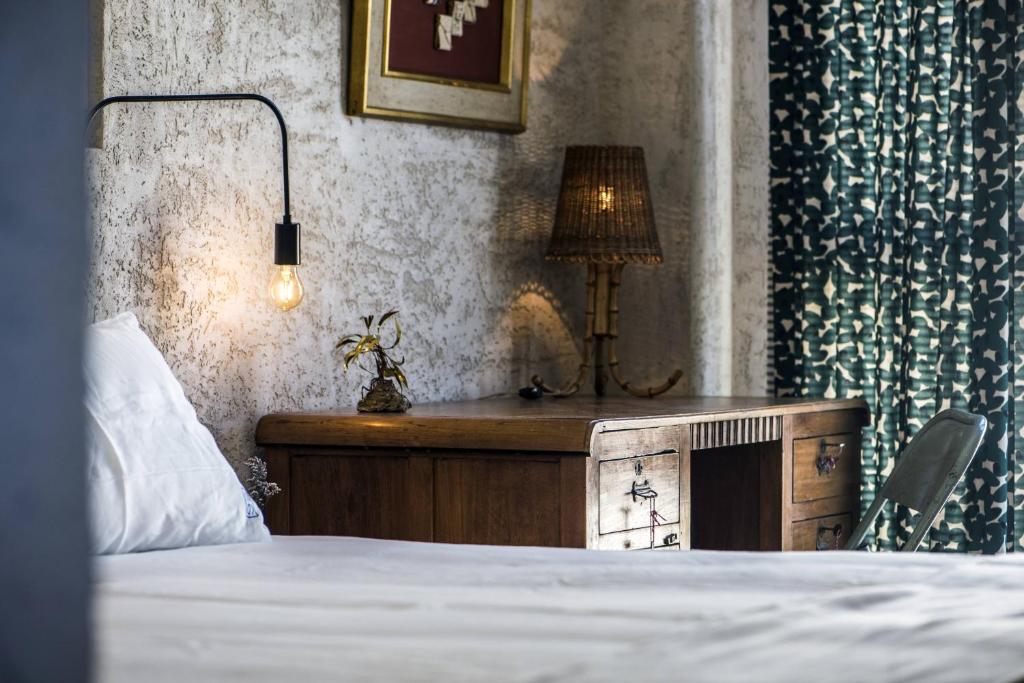 Postel nebo postele na pokoji v ubytování Kook Hotel Tarifa