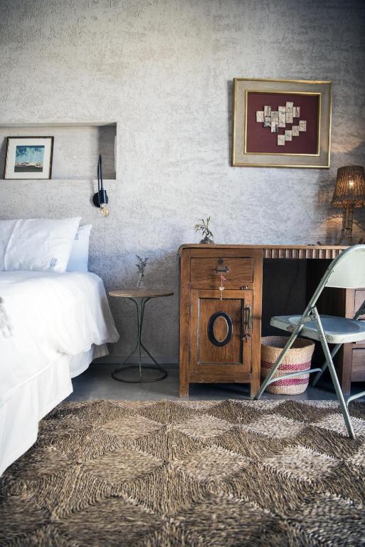 Postel nebo postele na pokoji v ubytování Kook Hotel Tarifa