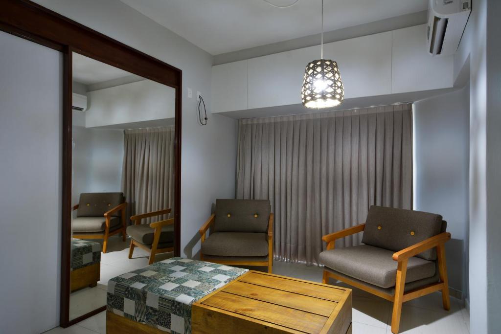 Uma área de estar em Littoral Hotel