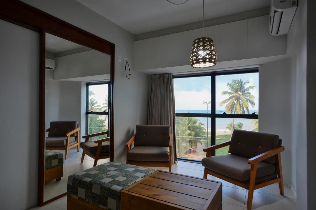 Uma área de estar em Littoral Hotel