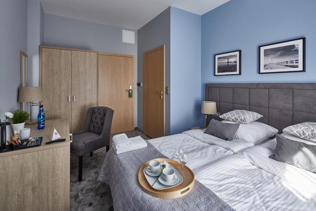 Posteľ alebo postele v izbe v ubytovaní Monte Carlo Apartments by OneApartments