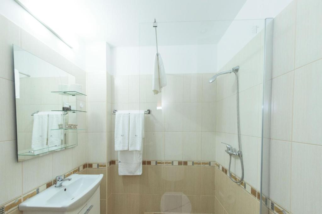 Koupelna v ubytování Hotel Promenada