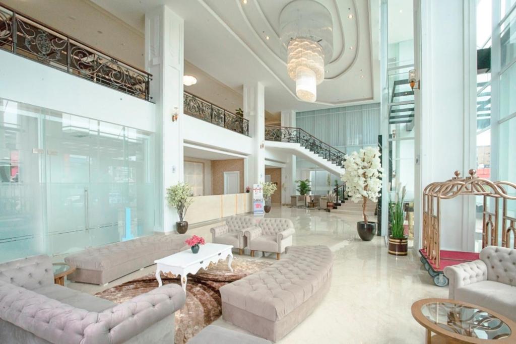 Posezení v ubytování Savero Hotel Depok