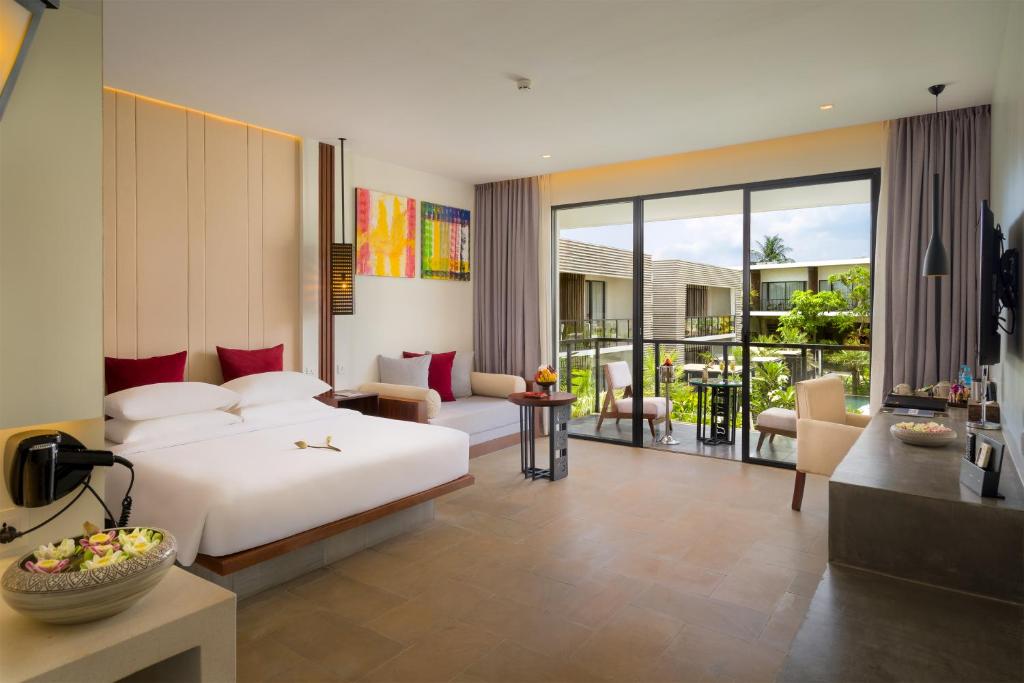 Postel nebo postele na pokoji v ubytování Metta Residence & Spa