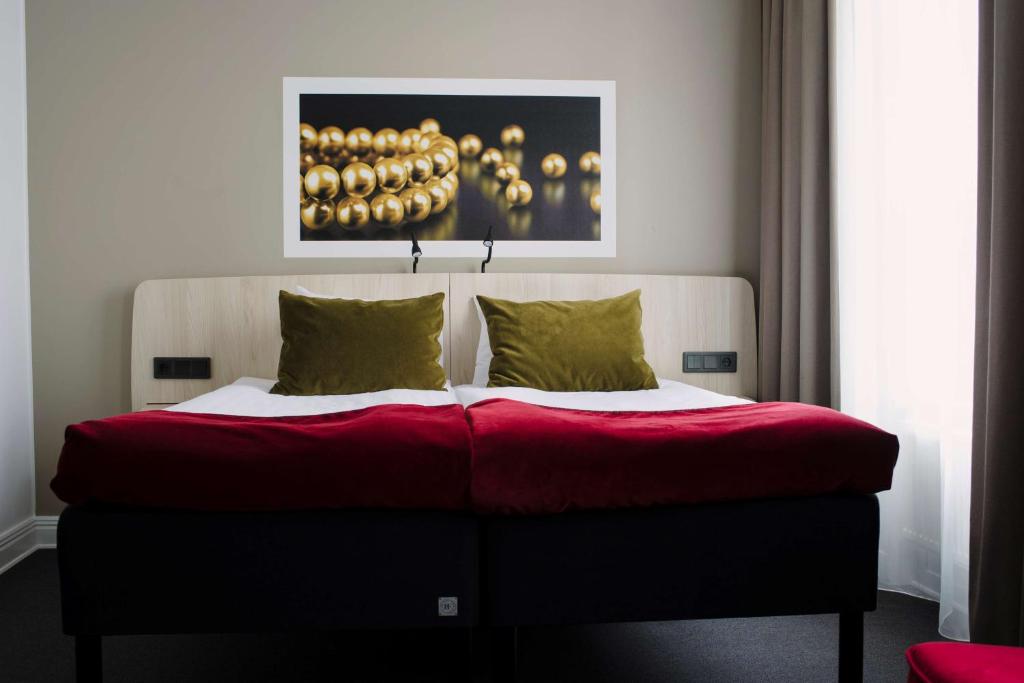 Postel nebo postele na pokoji v ubytování Best Western Hotel Svava