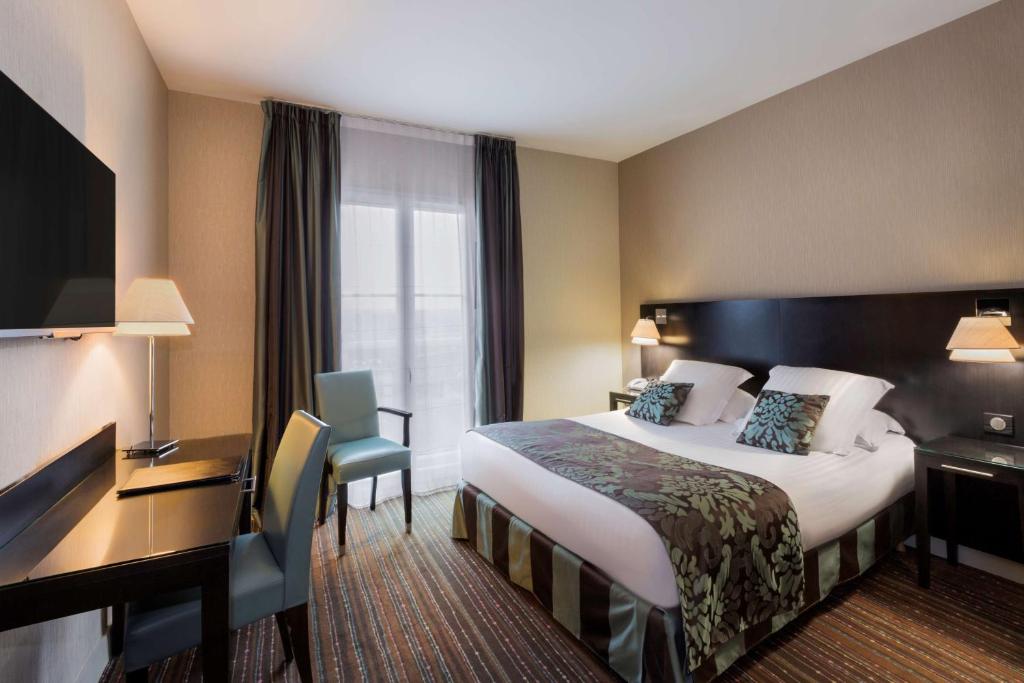 Postel nebo postele na pokoji v ubytování Best Western Plus Richelieu