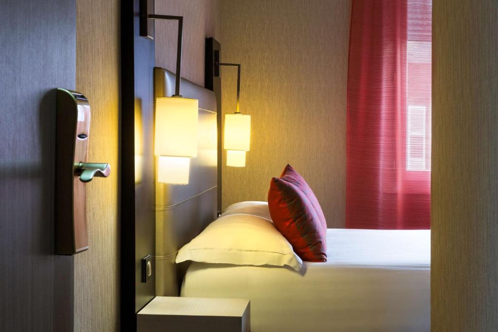 Postel nebo postele na pokoji v ubytování Best Western Plus Richelieu