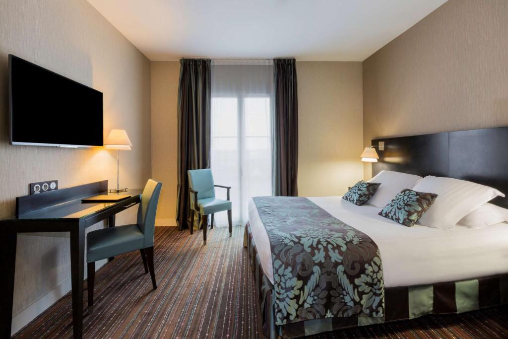 Postel nebo postele na pokoji v ubytování Best Western Plus Richelieu