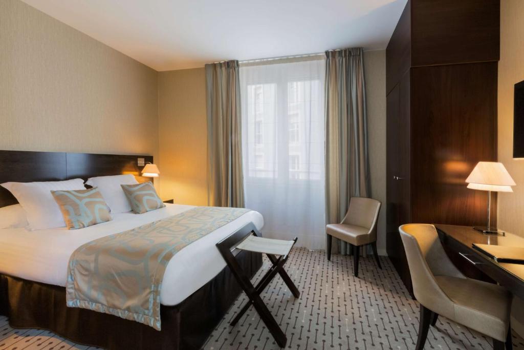 Postel nebo postele na pokoji v ubytování Best Western Plus Richelieu