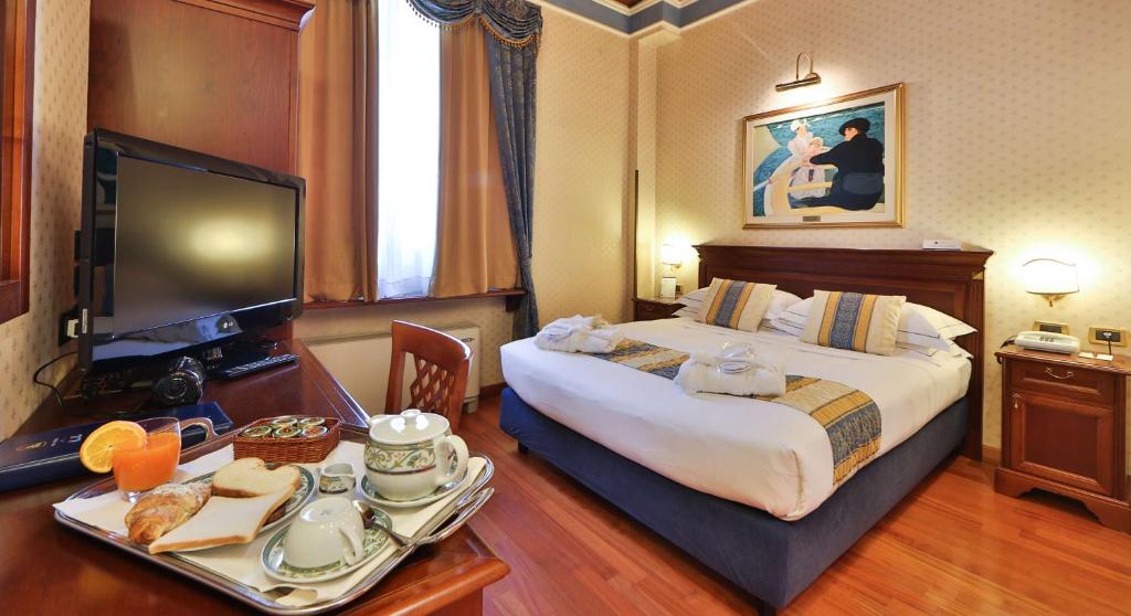 Posteľ alebo postele v izbe v ubytovaní Best Western Classic Hotel