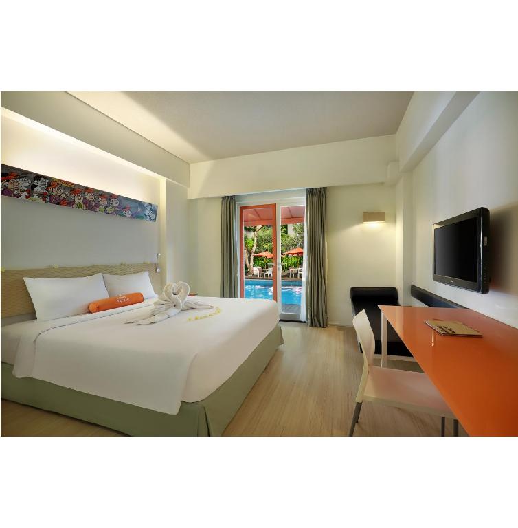 TV a/nebo společenská místnost v ubytování HARRIS Hotel & Residences Sunset Road