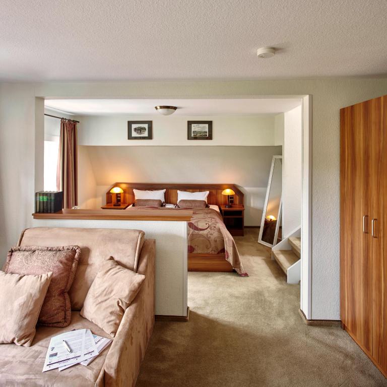 Postel nebo postele na pokoji v ubytování Hotel Hof Tütsberg