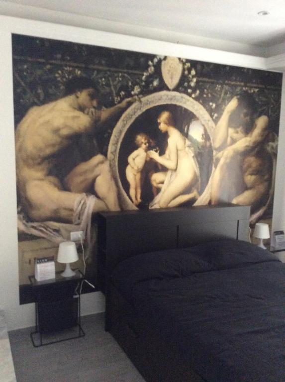A bed or beds in a room at Cico B&B