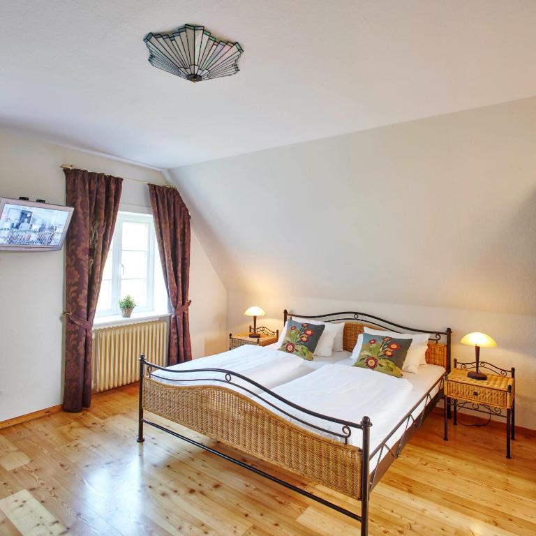 Postel nebo postele na pokoji v ubytování Hotel Hof Tütsberg