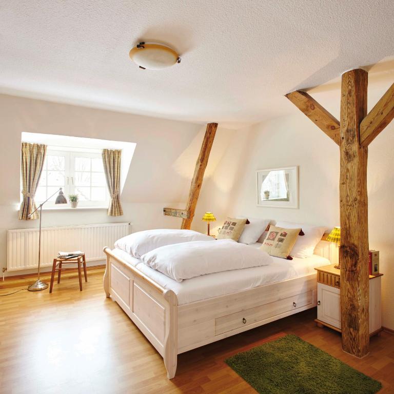 Postel nebo postele na pokoji v ubytování Hotel Hof Tütsberg