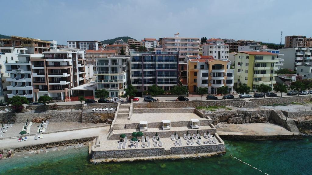 an aerial view of a city with buildings and water at Apartments Palma in Dobra Voda