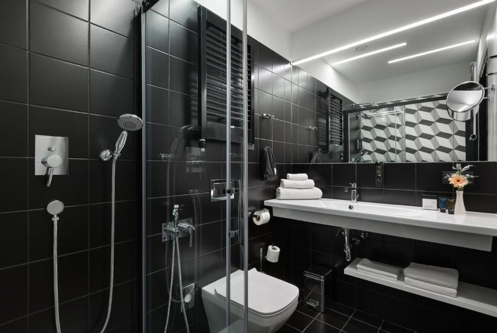 Koupelna v ubytování BANKHOTEL