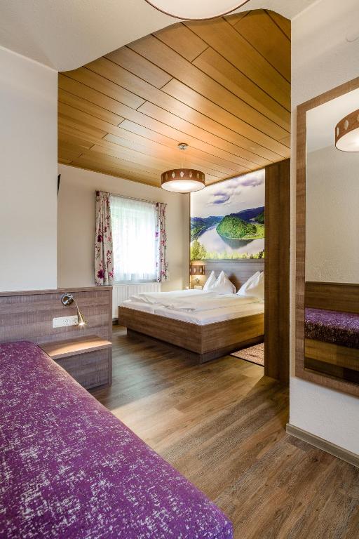 Postel nebo postele na pokoji v ubytování Gasthof Gierlinger