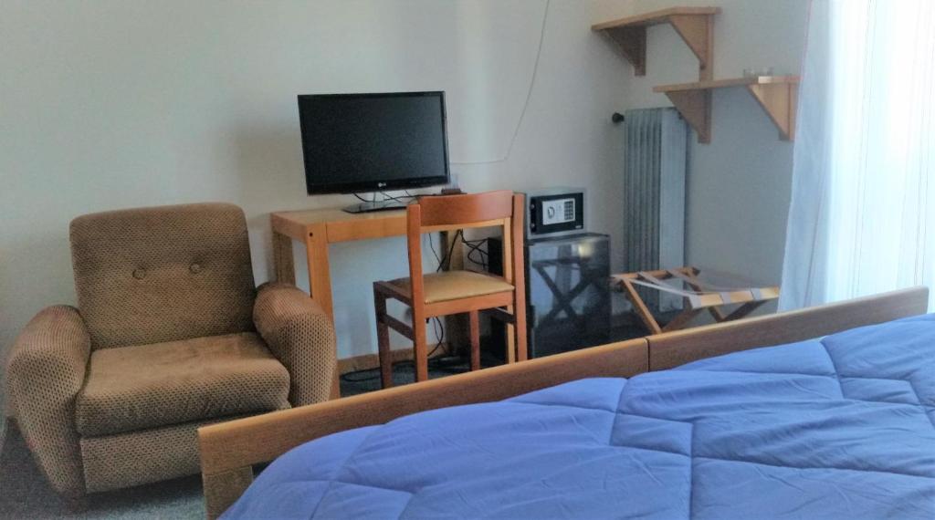TV a/nebo společenská místnost v ubytování Hotel Tomei