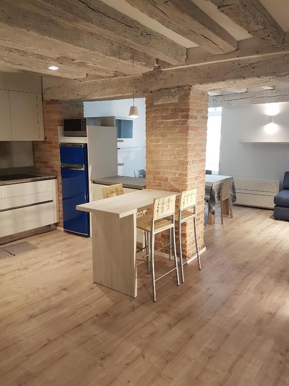 A kitchen or kitchenette at CORTE SCONTA Mini-Loft