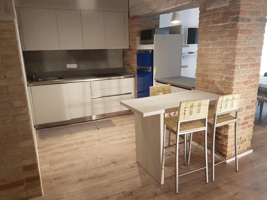 A kitchen or kitchenette at CORTE SCONTA Mini-Loft