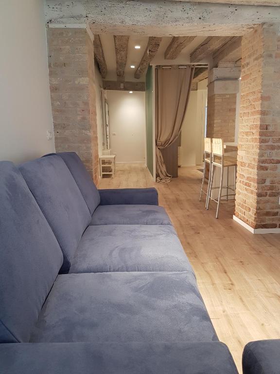 A seating area at CORTE SCONTA Mini-Loft