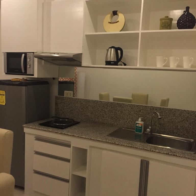 Kuchyň nebo kuchyňský kout v ubytování Alta Residences