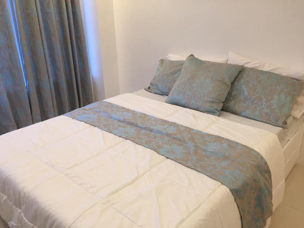Postel nebo postele na pokoji v ubytování Alta Residences