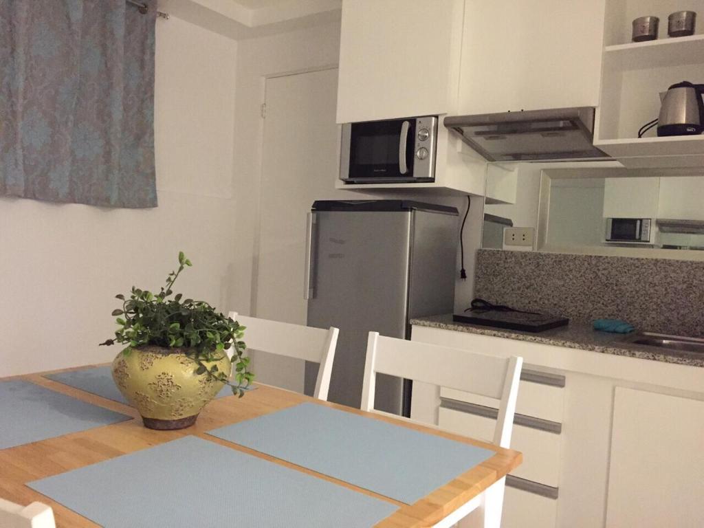 Kuchyň nebo kuchyňský kout v ubytování Alta Residences