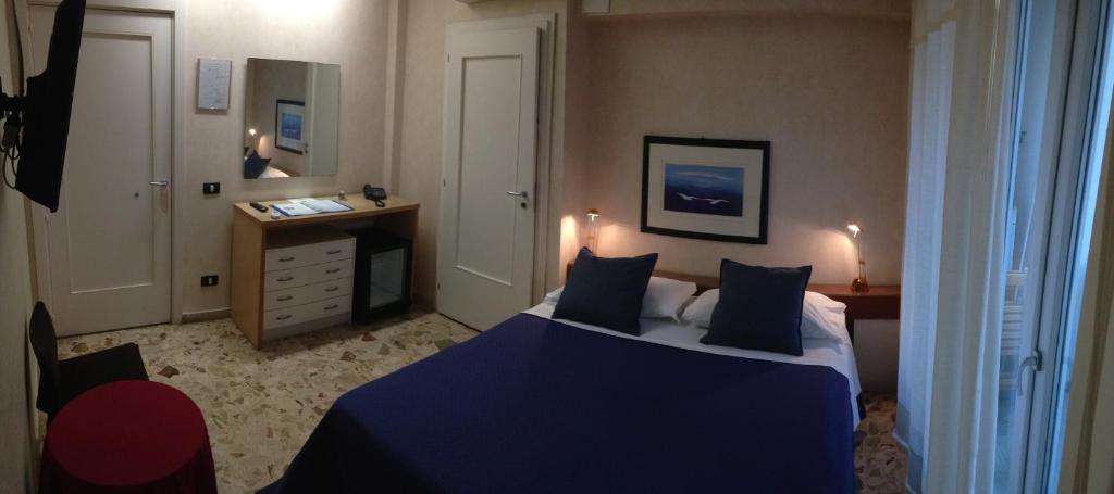 Postel nebo postele na pokoji v ubytování Mare Nostrum Petit Hôtel