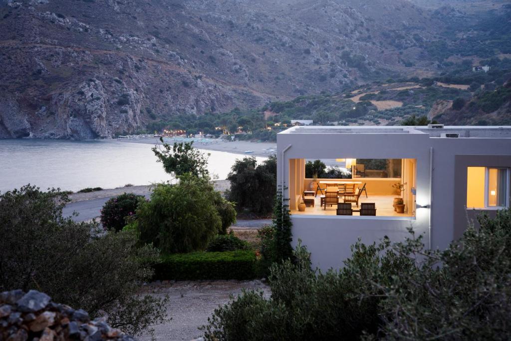 a small house with a view of a lake at Alikes Villa in Plakias