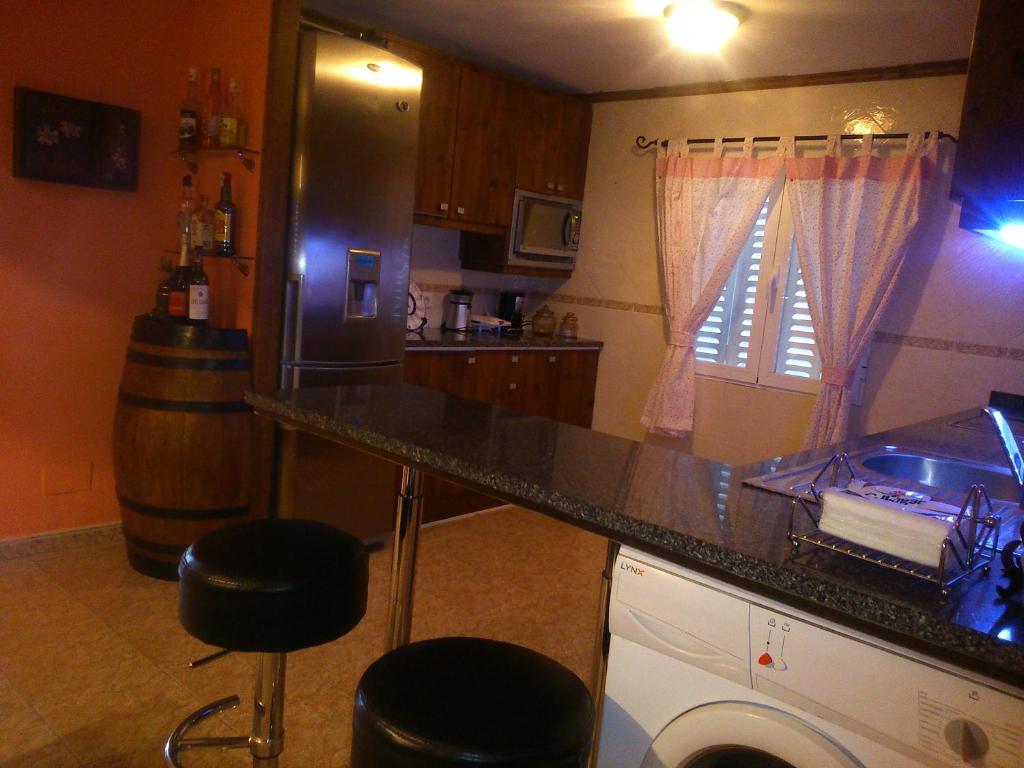 Kuchyň nebo kuchyňský kout v ubytování Casa Rural La Finca